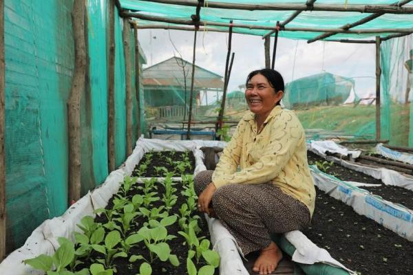 Former fisherwoman with her floating vegetable garden